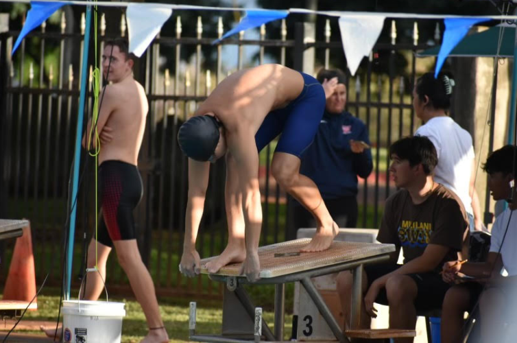 OIA swimmer at the starting block