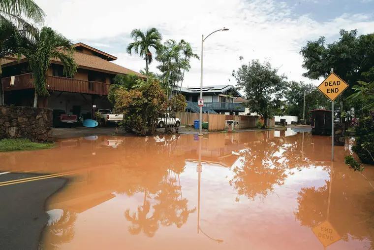 2026 March 21, Honolulu Star-Advertiser photo by George F. Lee. Waialua flood damage as a result from Kona Low storm. 
